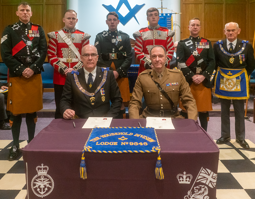 Group of people with signed armed forces covenant
